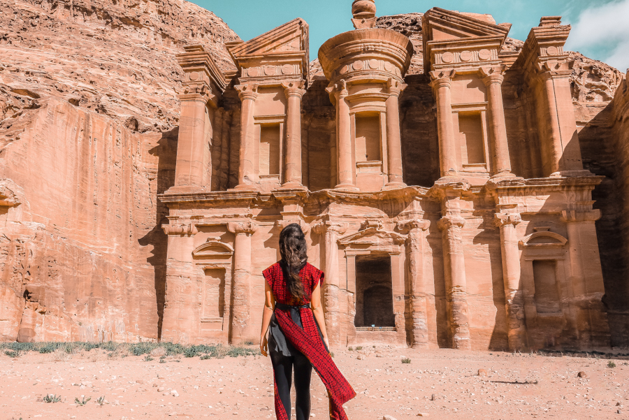 Standing in front of the Monastery in Petra in Jordan, one of the landmarks you'll get to see when you visit Petra in a day