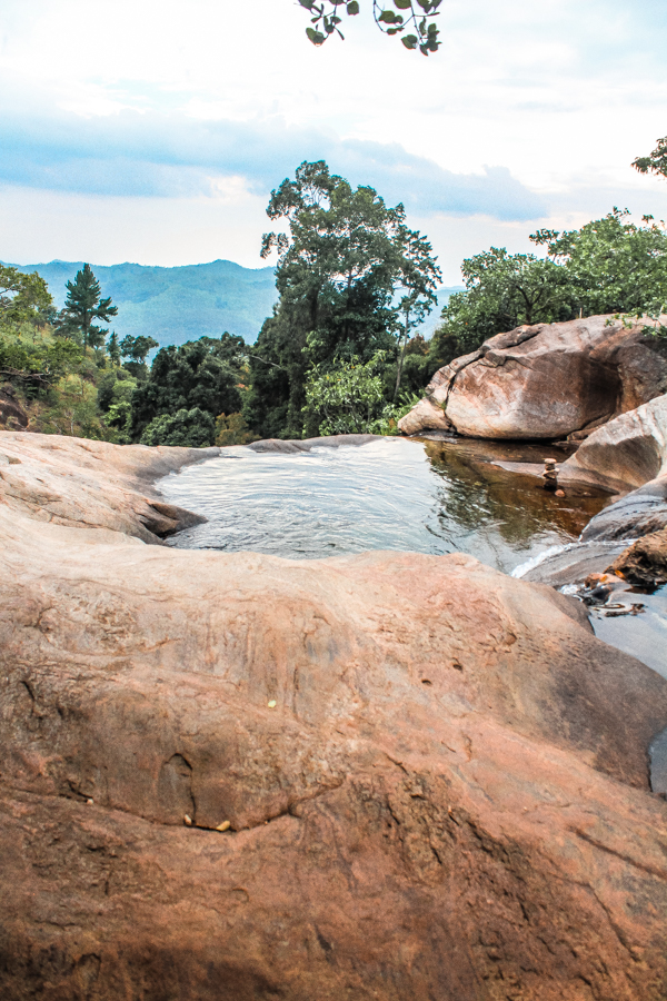 A visit to Ella, Sri Lanka isn't complete without taking a day trip to Diyaluma Falls and swimming at the top of Sri Lanka's highest waterfall!